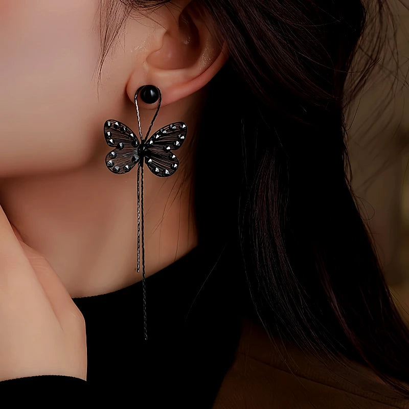 Close-up detail of the sparkling zircons and plating on the Butterfly Tassel Earrings