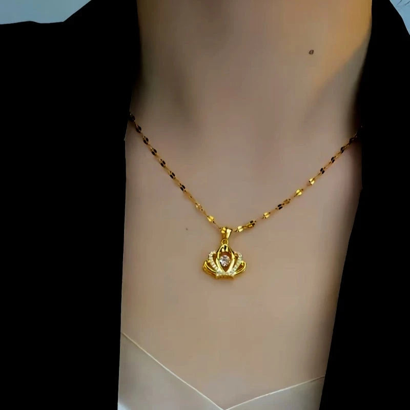 Detailed view of the 14K Gold-Plated Diamond Crown Necklace chain and pendant
