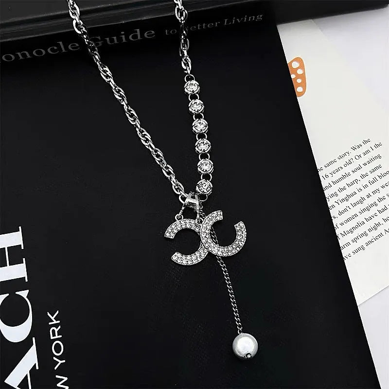 Detailed view of the 14K Gold-Plated Diamond Double C Letter Pendant Necklaces chain and pendant
