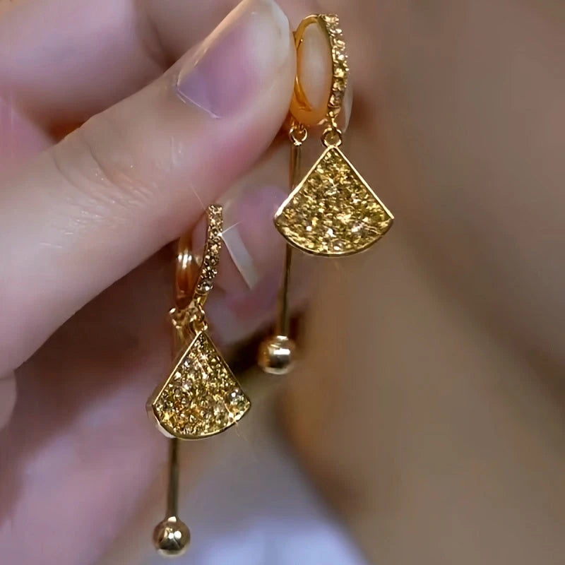 Close-up detail of the sparkling zircons and plating on the Fan Shaped Earrings
