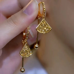Close-up detail of the sparkling zircons and plating on the Fan Shaped Earrings