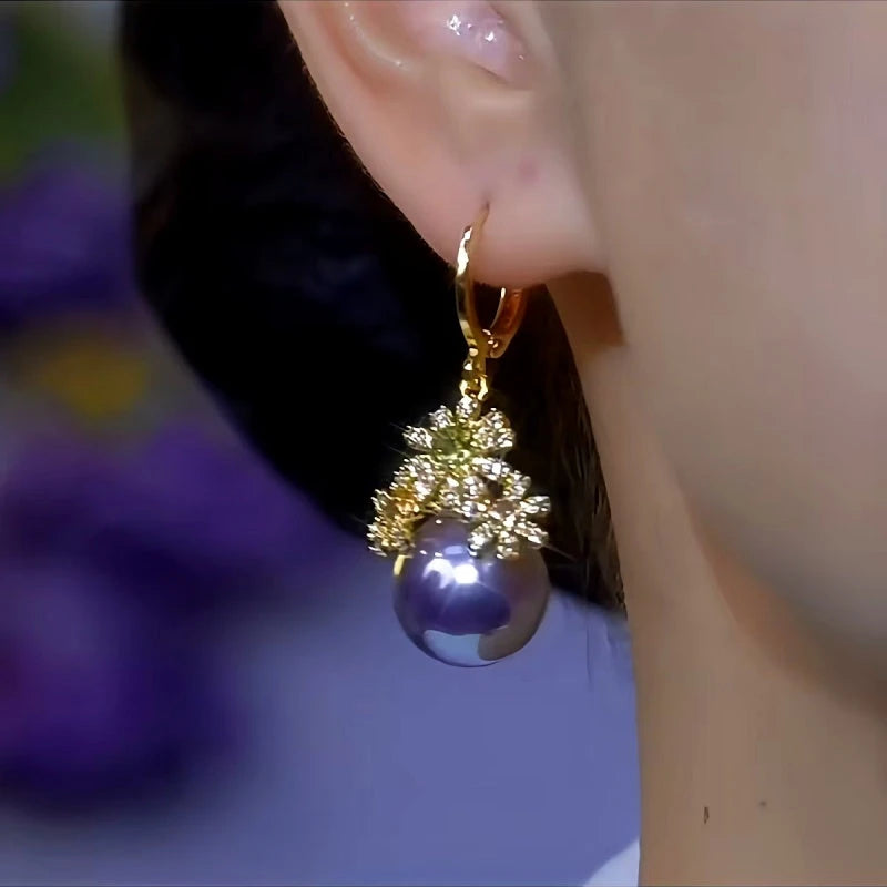 Close-up detail of the sparkling zircons and plating on the Purple Pearl Earrings