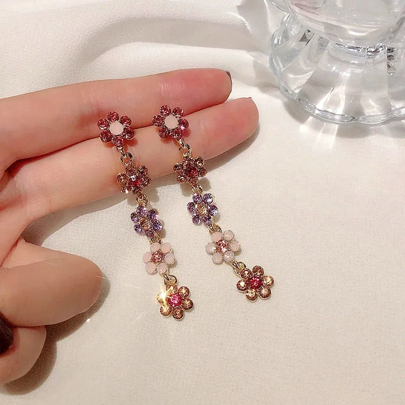 Close-up detail of the sparkling zircons and plating on the Flower Tassel Earrings