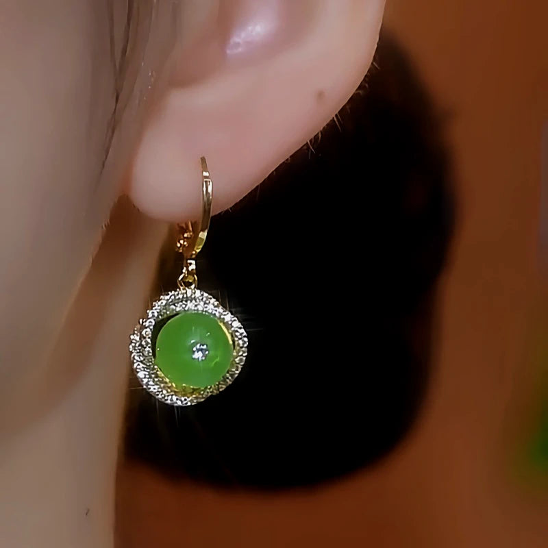 Close-up detail of the sparkling zircons and plating on the Spiral Drop Earrings