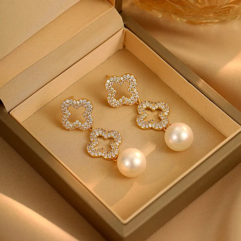 Close-up detail of the sparkling zircons and plating on the Four-Leaf Clover Earrings