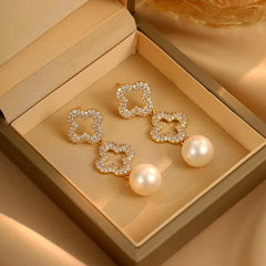 Close-up detail of the sparkling zircons and plating on the Four-Leaf Clover Earrings