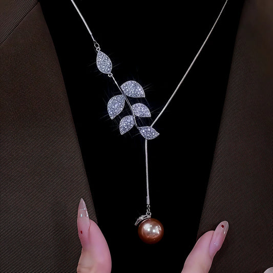 14K Gold-Plated Diamond Leaf Pearl Necklace worn to showcase its length and pendant detail