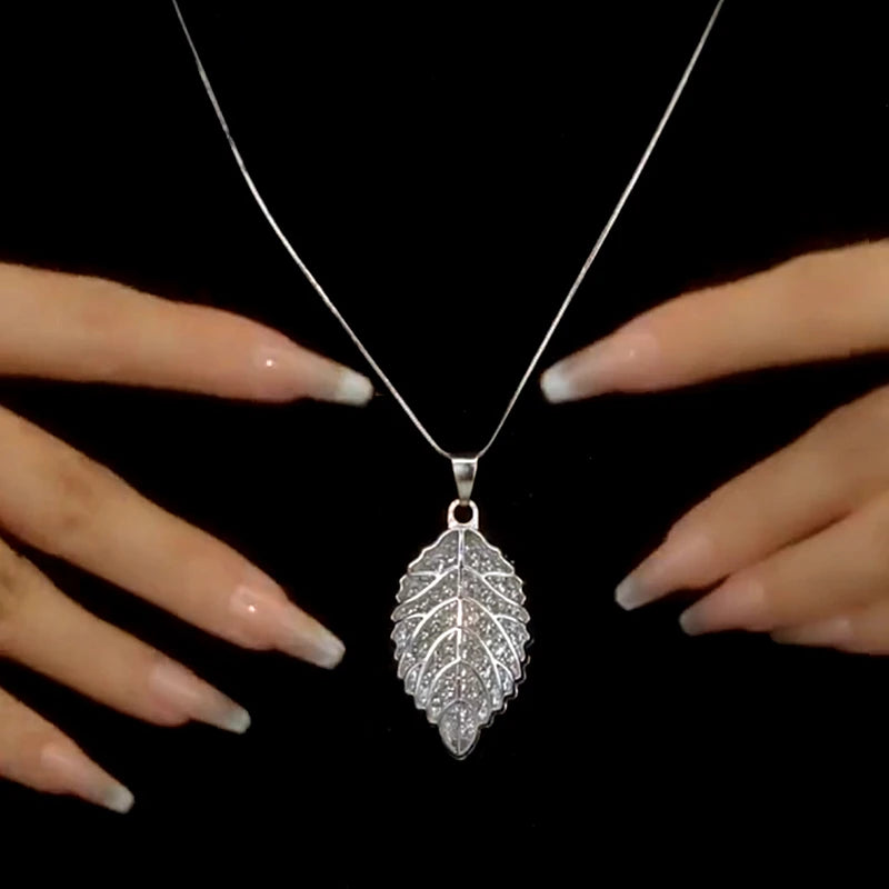 14K Gold-Plated Diamond Leaf Sweater Chain Necklace worn to showcase its length and pendant detail