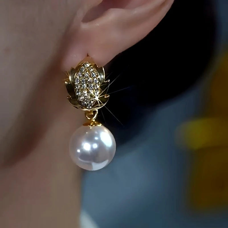 Close-up detail of the sparkling zircons and plating on the White Pearl Earrings