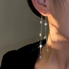 Close-up detail of the sparkling zircons and plating on the Long Tassel Earrings
