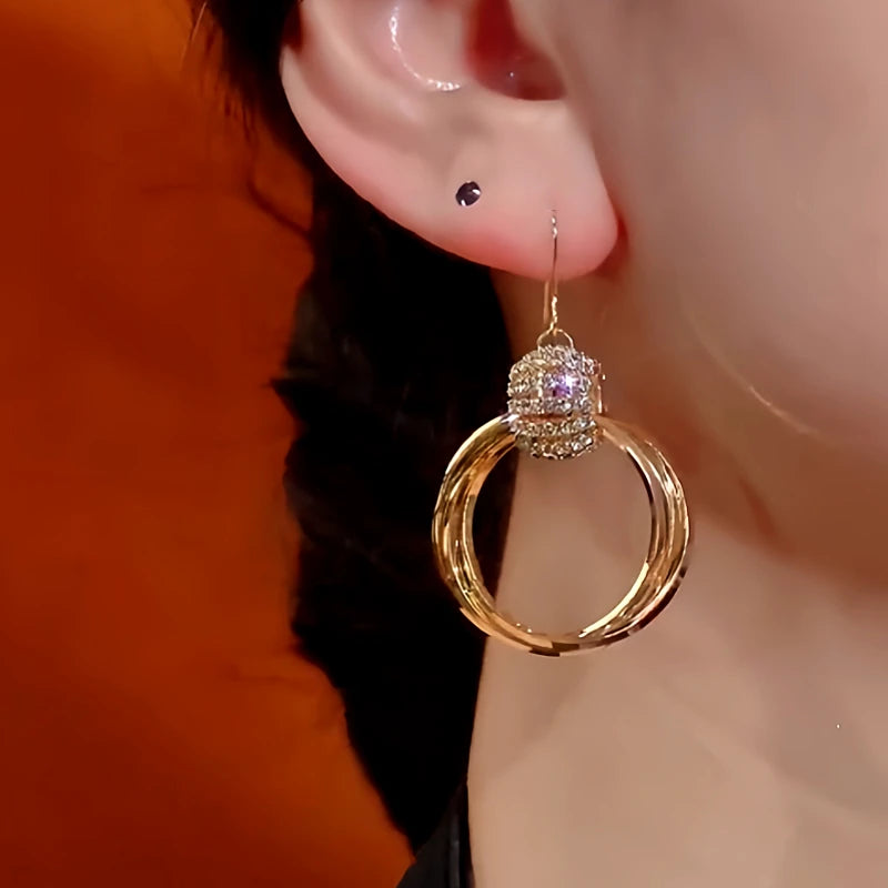 Close-up detail of the sparkling zircons and plating on the Multi-Layer Hoop Earrings