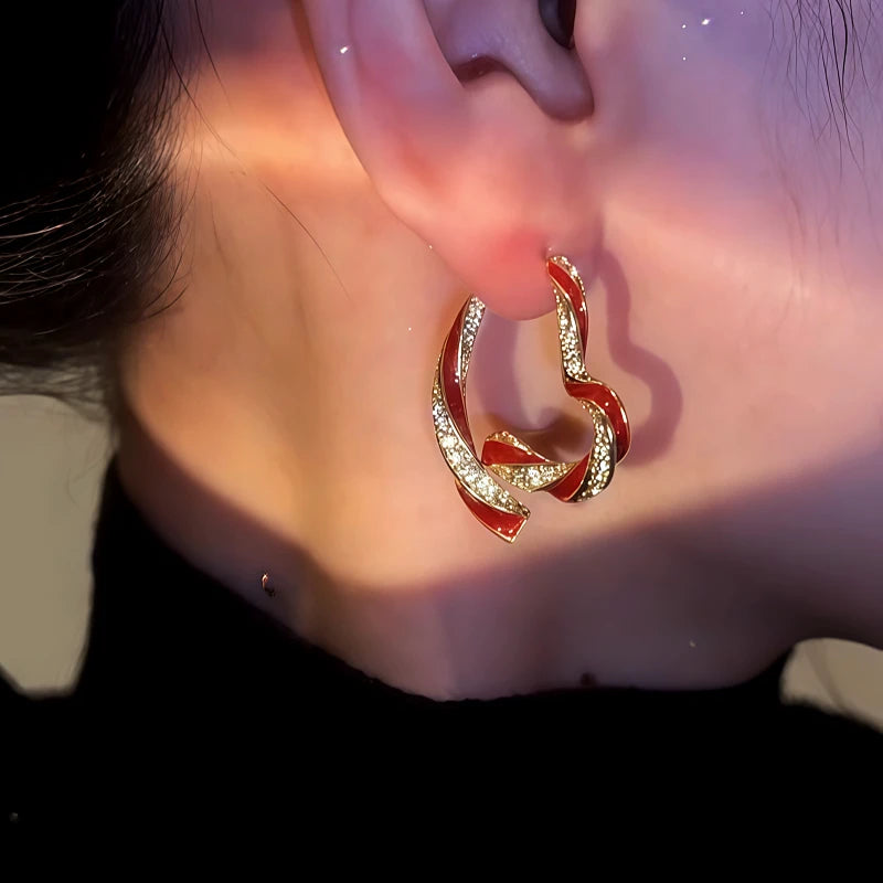 Close-up detail of the sparkling zircons and plating on the Heart-Design Earrings