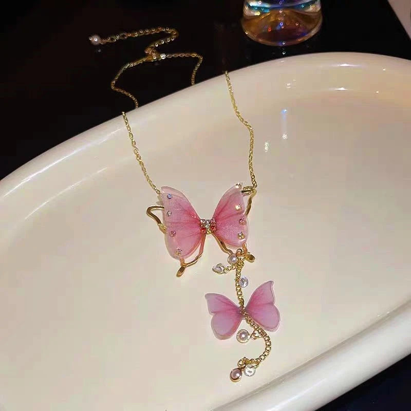 Close-up of the pendant and clasp on the Butterfly Tassel Necklace