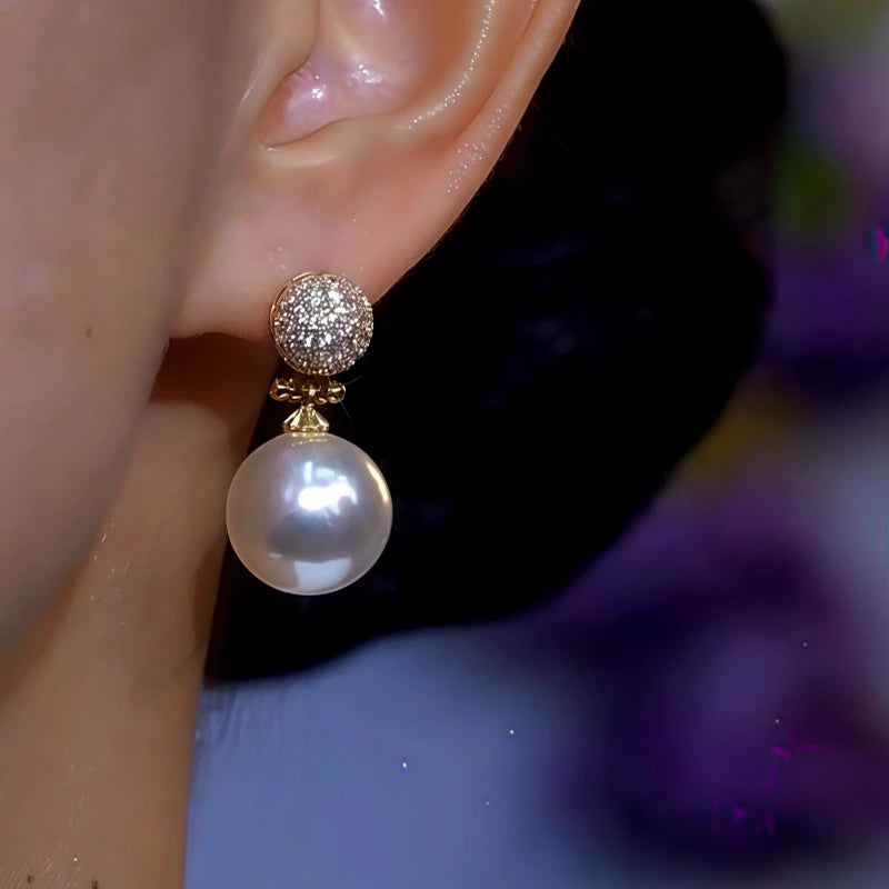 Close-up detail of the sparkling zircons and plating on the Pearl Drop Earrings