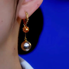 Close-up detail of the sparkling zircons and plating on the Brown Pearl Earrings