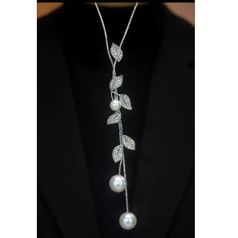 14K Gold-Plated Diamond Pearl Leaf Sweater Necklace worn to showcase its length and pendant detail