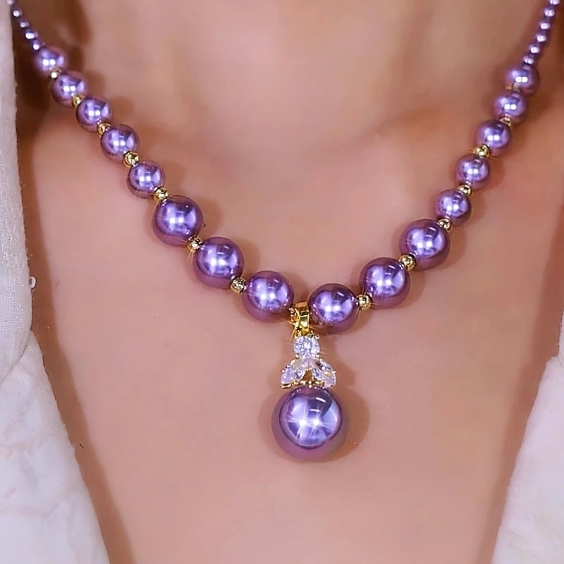 Detailed view of the 14K Gold-Plated Diamond Purple Pearl Necklace chain and pendant