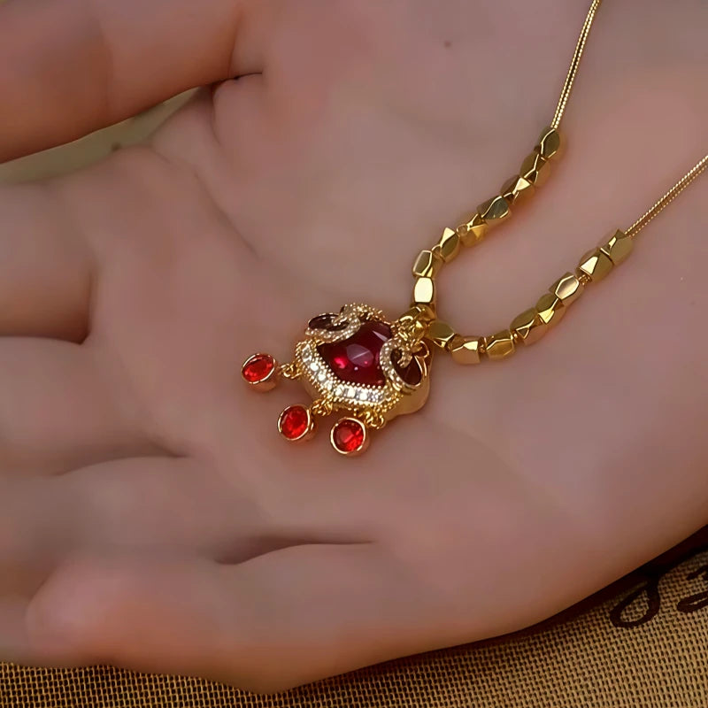 Detailed view of the 14K Gold-Plated Diamond Ruyi Lock Necklace chain and pendant