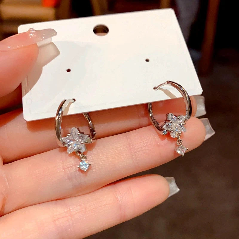 Angled view of the 14K Gold-Plated Diamond Star Earrings