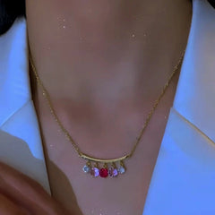 14K Gold-Plated Diamond Tassel Earrings worn to showcase its length and pendant detail