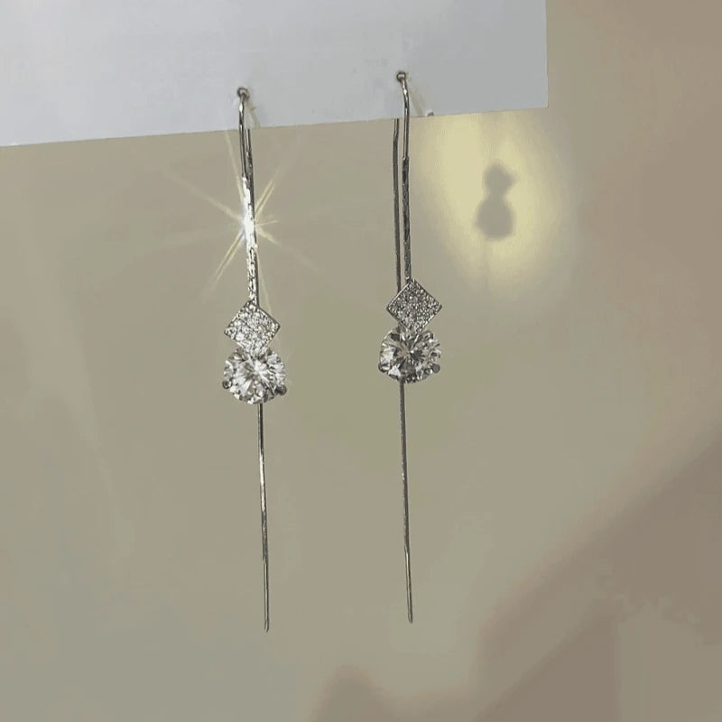 Angled view of the 14K Gold-Plated Diamond Threader Earrings