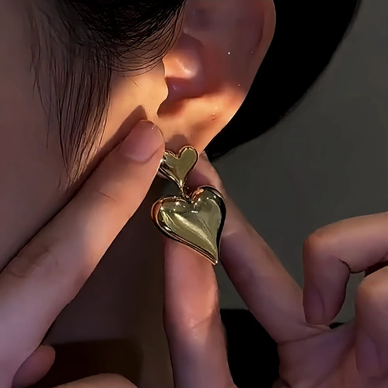 Angled view of the 14K Gold-Plated Double-Heart Earrings