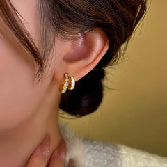 Close-up detail of the sparkling zircons and plating on the Double-Layer Earrings