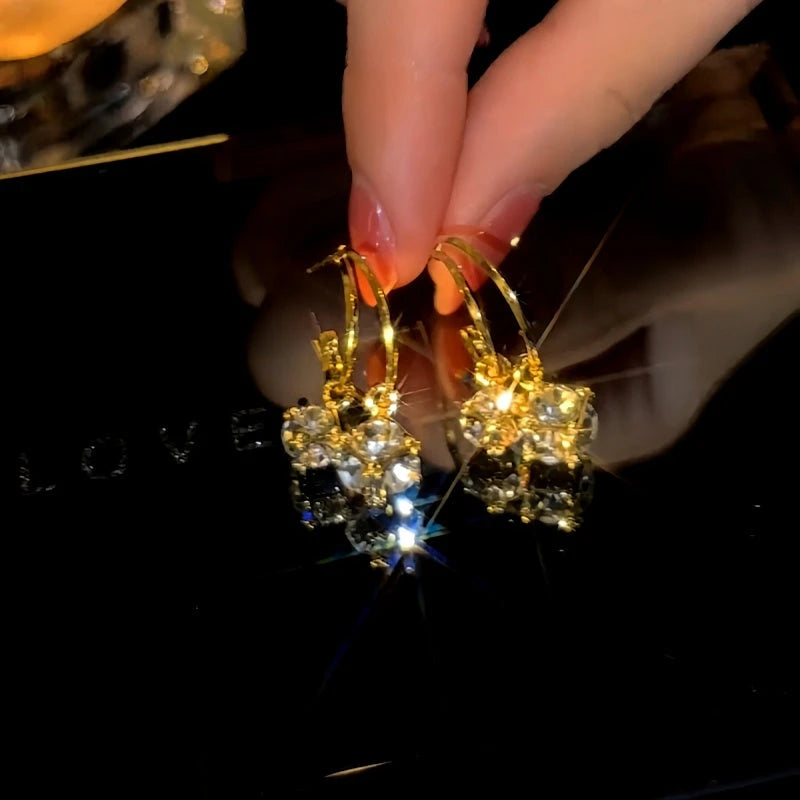 Close-up detail of the sparkling zircons and plating on the Double-Layer Tassel Earrings