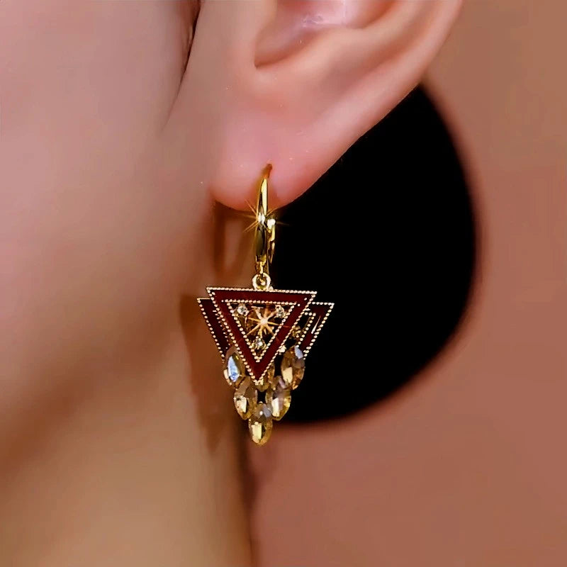 Model showcasing the dangle and style of the 14K Gold-Plated Double-Layer Diamond Earrings