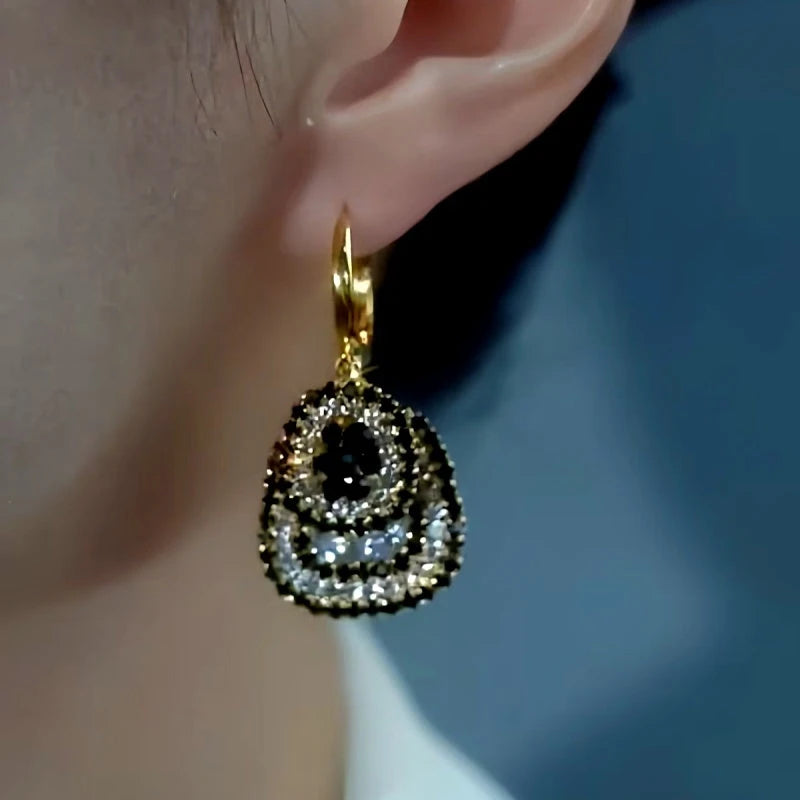 Close-up detail of the sparkling zircons and plating on the Double-Layer Earrings