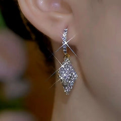 Close-up detail of the sparkling zircons and plating on the Double-Layer Earrings