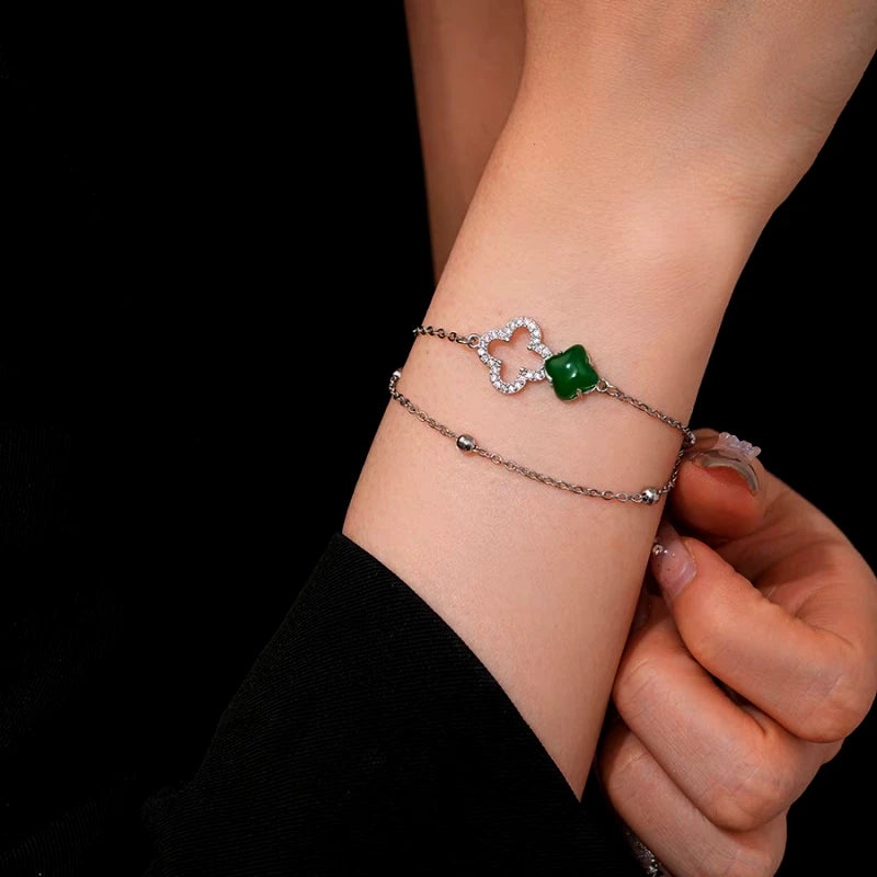 Model wearing the 14K Gold-Plated Double-Layer Four-Leaf Zircon Diamond Bracelets to highlight its design on the wrist