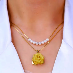 Close-up of the pendant and clasp on the Rose Pearl Necklace