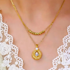 Close-up of the pendant and clasp on the Hollow Pendant Necklace