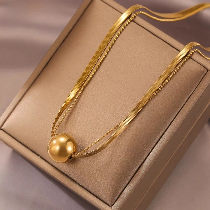 14K Gold-Plated Double-Layer Lucky Ball Necklace worn to showcase its length and pendant detail