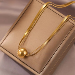 14K Gold-Plated Double-Layer Lucky Ball Necklace worn to showcase its length and pendant detail
