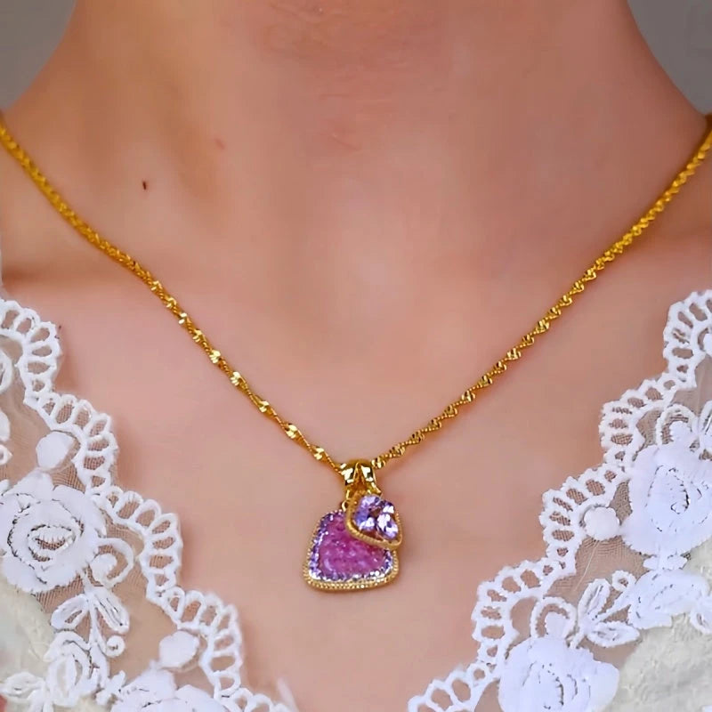 Close-up of the pendant and clasp on the Purple Crystal Necklace