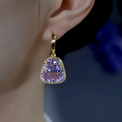 Close-up detail of the sparkling zircons and plating on the Purple Tassel Earrings