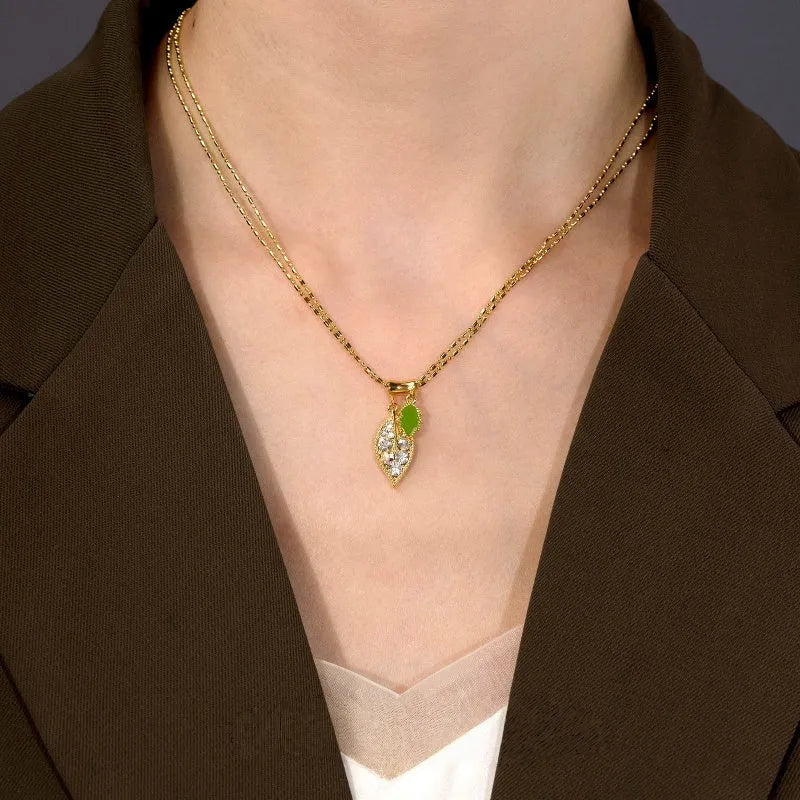 14K Gold-Plated Double-Layer Zircon Green Oil Drop Leaf Necklace worn to showcase its length and pendant detail