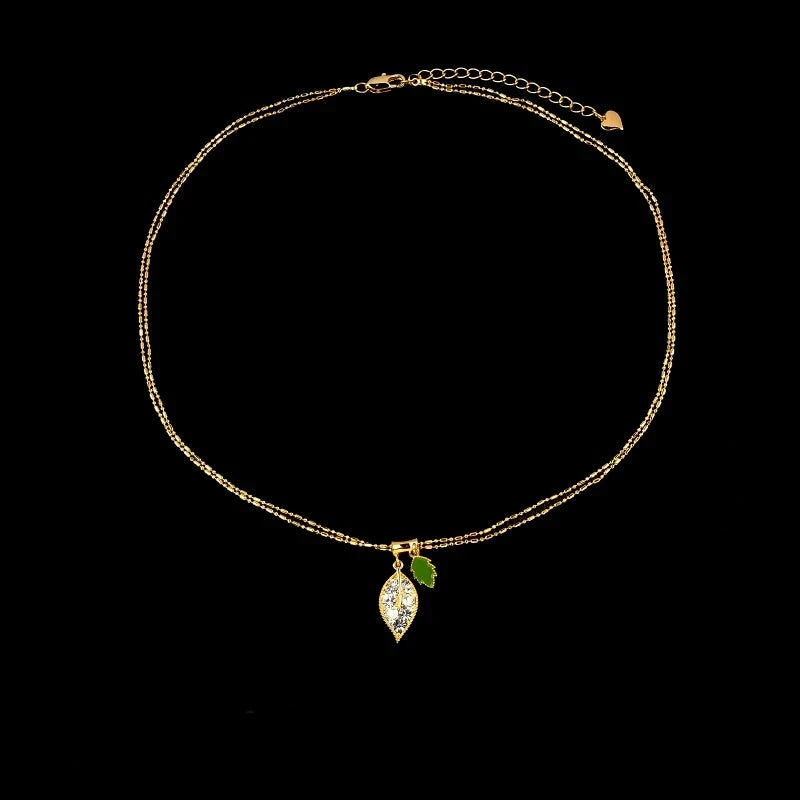 Close-up of the pendant and clasp on the Leaf Necklace