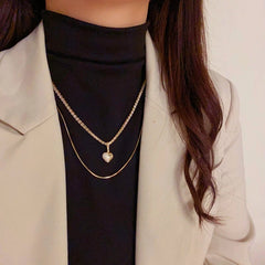 Close-up of the pendant and clasp on the Love Pendant Necklace