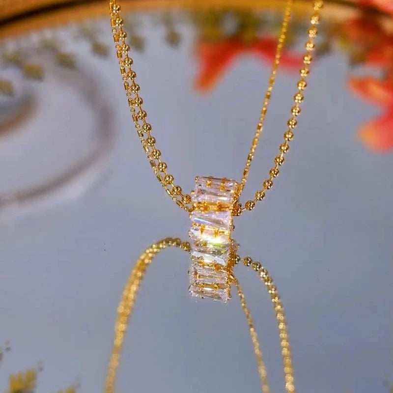 Close-up of the pendant and clasp on the Ring Pendant Necklace