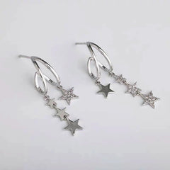 Angled view of the 14K Gold-Plated Double-Layer Zircon Star Tassel Earrings