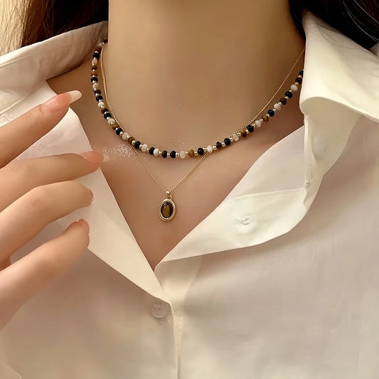 14K Gold-Plated Double-Layered Tiger Eye Stone Pendant Necklace worn to showcase its length and pendant detail