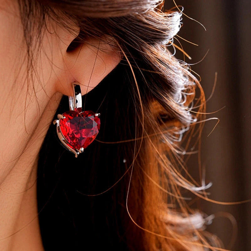 Close-up detail of the sparkling zircons and plating on the Double-Sided Heart Earrings
