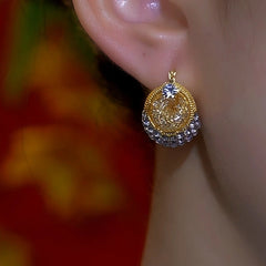 Close-up detail of the sparkling zircons and plating on the Mesh Earrings
