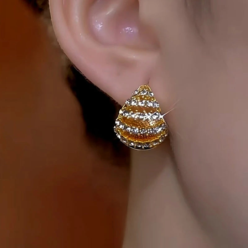 Close-up detail of the sparkling zircons and plating on the Water Drop Earrings