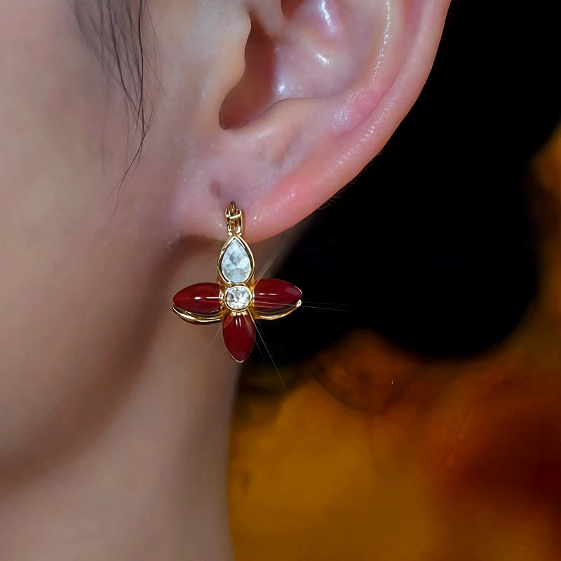 Close-up detail of the sparkling zircons and plating on the Double-Sided Flower Earrings