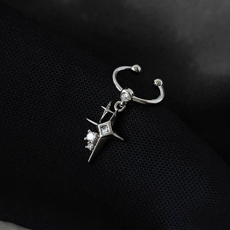 Angled view of the 14K Gold-Plated Double Cross Star Diamond Ear Clips