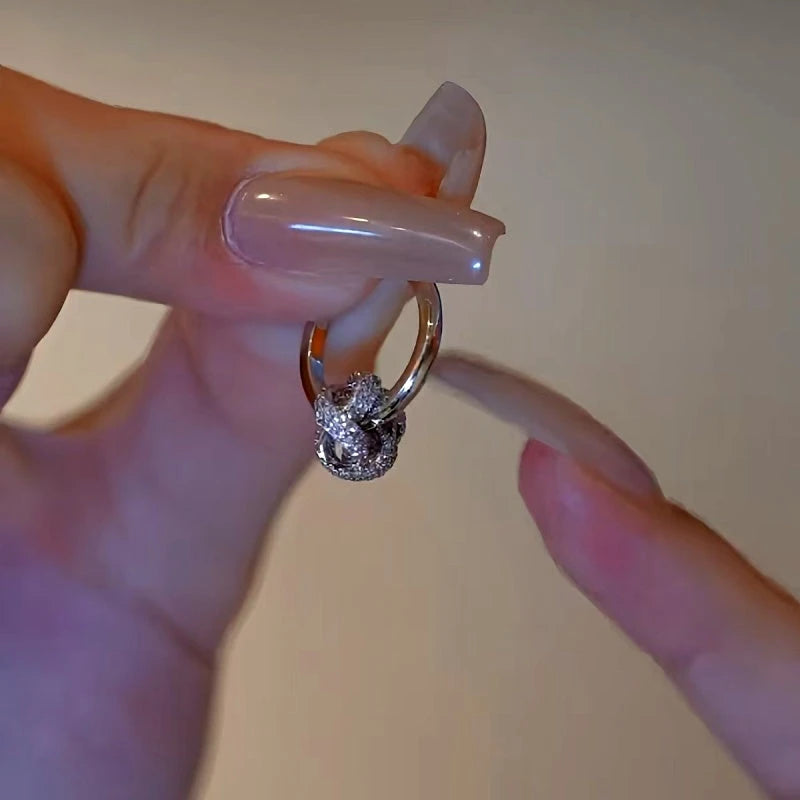 Close-up detail of the sparkling zircons and plating on the Plain Hoop Earrings